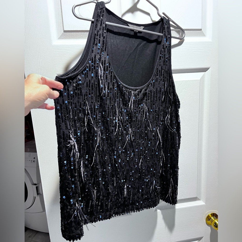 Black tank top with sequin and feather detail. Size 3X. Super cute and comfy.